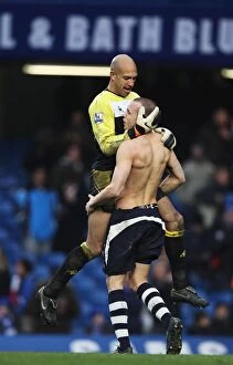 Images Dated 19th February 2011: Everton's Glory: Tim Howard and Johnny Heitinga Celebrate FA Cup Victory at Stamford Bridge