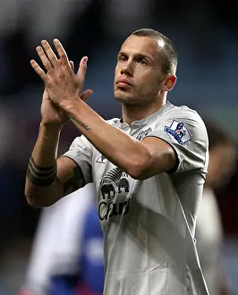Everton's Heitinga Salutes Fans: A Victory Moment at Villa Park (14 January 2012)