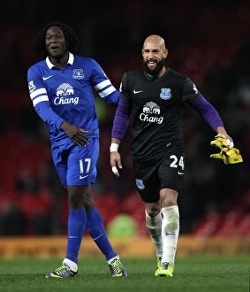Images Dated 4th December 2013: Everton's Historic Upset: Lukaku and Howard's Jubilant Celebration after 1-0 Victory over