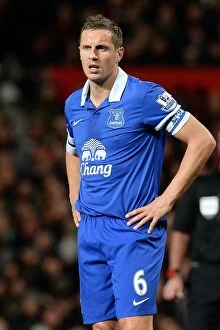 Images Dated 4th December 2013: Everton's Historic Victory: Jagielka's Goal Secures 1-0 Triumph Over Manchester United at Old