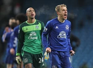 20 December 2010 Manchester City v Everton Collection: Everton's Historic Victory: Tim Howard and Phil Neville's Triumphant Moment Against Manchester City