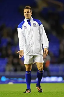 Framed Print : Everton's Jagielka in Focus: Pre-Match Warm-Up at Goodison Park (Everton vs Swansea City, Barclays Premier League, 21 December 2011) Framed Print : Everton's Jagielka in Focus: Pre-Match Warm-Up at Goodison Park (Everton vs Swansea City, Barclays Premier League, 21 December 2011)