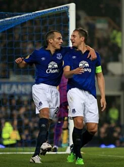 Images Dated 6th November 2014: Everton's Jagielka and Osman: Celebrating a Europa League Double Strike Against Lille