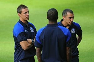 Images Dated 2nd August 2011: Everton's Jagielka and Osman Pre-Match Huddle at Werder Bremen (02.08.2011)