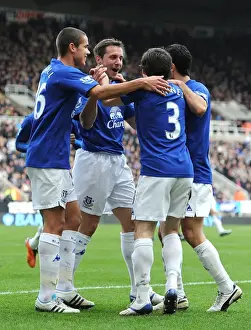 05 March 2011 Newcastle United V Everton Prints: Everton's Jagielka Scores and Celebrates with Team against Newcastle United (05)
