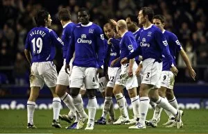 Images Dated 3rd December 2006: Evertons James Vaughan celebrates with his team mates after scoring his teams second goal