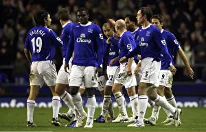 Evertons James Vaughan celebrates with his team mates after scoring his teams second goal
