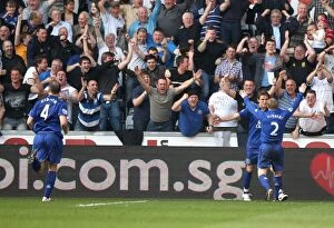 24 March 2012 v Swansea City, Liberty Stadium Collection: Everton's Jelavic and Hibbert: Celebrating a Memorable Second Goal Against Swansea City