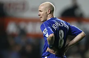 Evertons Johnson holds his side after their English Premier League soccer match against Aston Villa