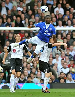Fulham V Everton Prints: Everton's Joseph Yobo vs. Fulham's Andrew Johnson: Aerial Battle in the Premier League