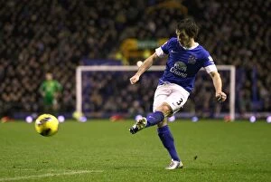 Images Dated 26th December 2012: Everton's Leighton Baines in Action: Securing Victory over Wigan Athletic in the Barclays Premier