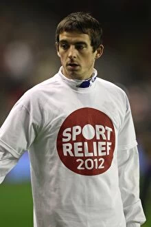 Images Dated 13th March 2012: Everton's Leighton Baines Goes Head-to-Head Against Liverpool at Anfield in Barclays Premier