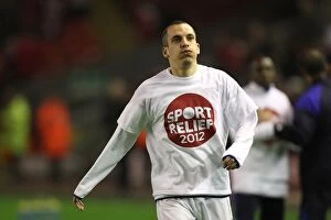 Images Dated 13th March 2012: Everton's Leon Osman in Intense Premier League Showdown at Anfield (13 March 2012)