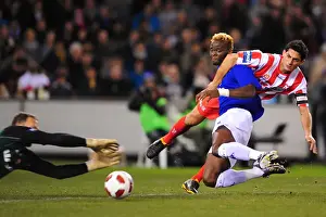 Everton's Louis Saha vs Melbourne Heart's Simon Colosimo: Intense Clash during Pre-Season Friendly at Etihad Stadium