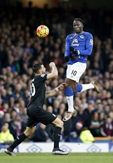 Images Dated 28th December 2015: Everton's Lukaku Outjumps Cameron: Aerial Battle at Goodison Park