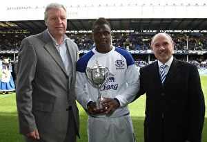 Images Dated 13th May 2012: Everton's Magaye Gueye Receives Barclays Premier League Trophy Prior to Everton vs Newcastle