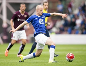 Pre-Season Friendly - Heart Of Midlothian V Everton - Tynecastle Stadium Prints: Everton's Naismith in Action: Pre-Season Thriller at Tynecastle Stadium vs Heart of Midlothian