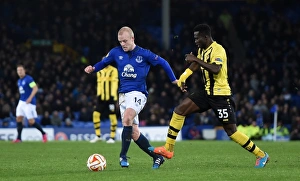Framed Print : Everton's Naismith Slips Past Young Boys Sanogo in Europa League Showdown at Goodison Park