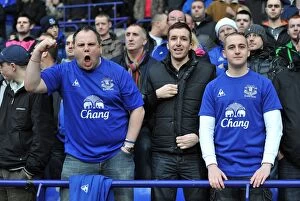 Images Dated 13th February 2011: Everton's Passionate Roar: A Sea of Fans at Reebok Stadium - Bolton Wanderers vs