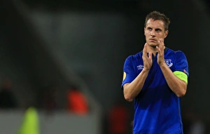 Framed Print : Everton's Phil Jagielka Celebrates UEFA Europa League Victory Over Lille OSC with Fans Framed Print : Everton's Phil Jagielka Celebrates UEFA Europa League Victory Over Lille OSC with Fans