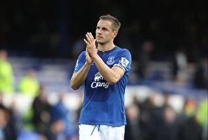 Images Dated 18th October 2014: Everton's Phil Jagielka: A Heartfelt Celebration with Fans after Securing a Hard-Fought Victory vs