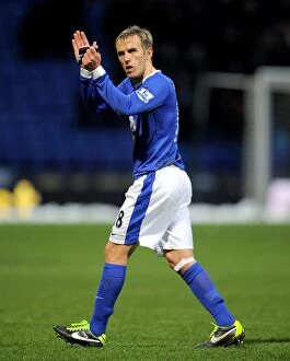 Images Dated 26th January 2013: Everton's Phil Neville Celebrates FA Cup Victory Over Bolton Wanderers at Reebok Stadium
