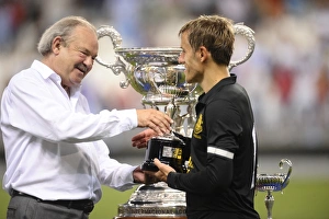 Everton's Phil Neville Celebrates Pre-Season Victory over Malaga CF with Trophy