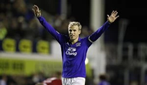 Images Dated 21st September 2011: Everton's Phil Neville: Thrilling Carling Cup Goal Secures Triumph Over West Bromwich Albion at