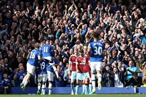 Everton v Burnley - Goodison Park Collection: Everton's Romelu Lukaku Scores Third Goal, Celebrates with Team and Fans at Goodison Park