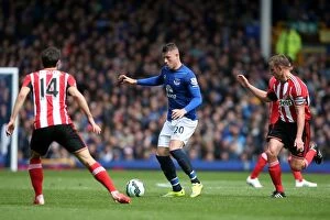 Images Dated 9th May 2015: Everton's Ross Barkley Faces Off Against Sunderland's Jordi Gomez