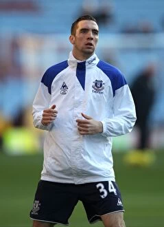 Images Dated 14th January 2012: Everton's Shane Duffy in the Heat of the Rivalry: Aston Villa vs