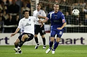 Images Dated 19th September 2006: Evertons Simon Davies and Peterbroughs Peter Gain in action