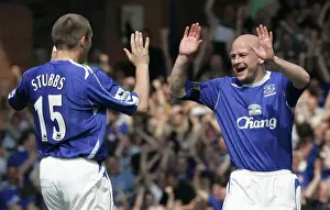 Evertons Stubbs celebrates with Carsley after scoring against Manchester United in Liverpool