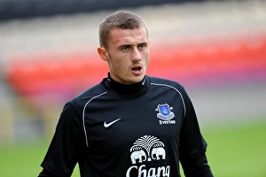 Season 2012-13 Prints: Everton's Taudul Stands Firm: Pre-Season Battle at Firhill Stadium