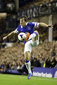 Season 2013-14 Prints: Everton's Thrilling 3-2 Victory Over Newcastle United: Leighton Baines in Action (30-09-2013)