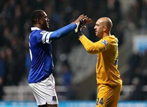 Images Dated 25th March 2014: Everton's Triumph: Howard and Distin Celebrate Historic 3-0 Victory Over Newcastle United (BPL, St)