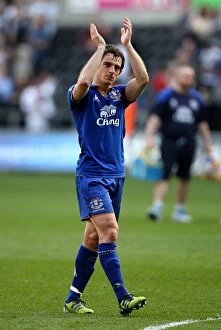 24 March 2012 v Swansea City, Liberty Stadium Collection: Everton's Triumph at Swansea: Leighton Baines Celebrates Victory (BPL 2011-2012)