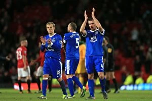 Images Dated 10th February 2013: Everton's Unforgettable Draw at Old Trafford: Gibson, Heitinga, Neville and the Ecstatic Fans