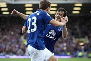 Images Dated 18th October 2014: Everton's Unforgettable Moment: Coleman and Baines Thrilling Goal Celebration (BPL)