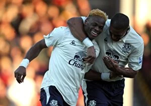 Images Dated 8th January 2011: Everton's Unforgettable Moment: Saha and Distin's Thrilling Goal Celebration vs