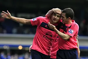 Tim Cahill Prints: Everton's Unforgettable Moment: Tim Cahill and Leighton Baines Celebrate the Toffees Second Goal vs