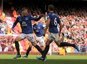Images Dated 27th September 2014: Everton's Unstoppable Duo: Jagielka and Stones Celebrate Historic Goal vs. Liverpool (BPL)