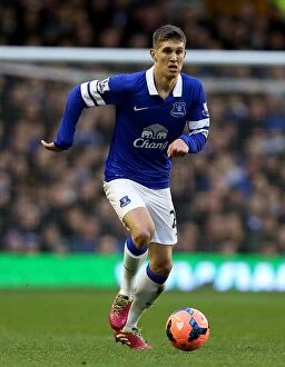 Images Dated 4th January 2014: Everton's Unstoppable John Stones: 4-0 FA Cup Victory over Queens Park Rangers (January 4, 2014)