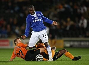 Images Dated 23rd September 2009: Everton's Yakubu Leaps Past Hull Defenders in Carling Cup Showdown