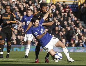 29 January 2011 Everton v Chelsea Collection: The FA Cup Battle: Arteta vs. Malouda at Goodison Park (Everton vs. Chelsea, 2011)