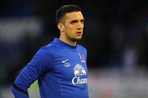 Images Dated 16th February 2013: FA Cup Fifth Round: Shane Duffy's Determined Performance for Everton at Oldham Athletic