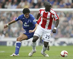Framed Print : Faye vs. Fellaini: A Battle at The Britannia Stadium - Stoke City vs. Everton, Premier League, 2008 Framed Print : Faye vs. Fellaini: A Battle at The Britannia Stadium - Stoke City vs. Everton, Premier League, 2008