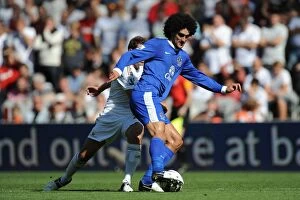 Images Dated 22nd September 2012: Fellaini Escapes: Everton Crush Swansea 3-0 in Premier League Showdown (September 22, 2012)