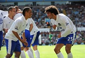 Images Dated 25th August 2012: Fellaini and Pienaar: Everton's Unstoppable Duo Celebrate Second Goal vs. Aston Villa (25-08-2012)