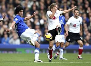 Everton v Fulham Collection: Fellaini vs Bullard: Intense Clash Between Everton's Marouane Fellaini